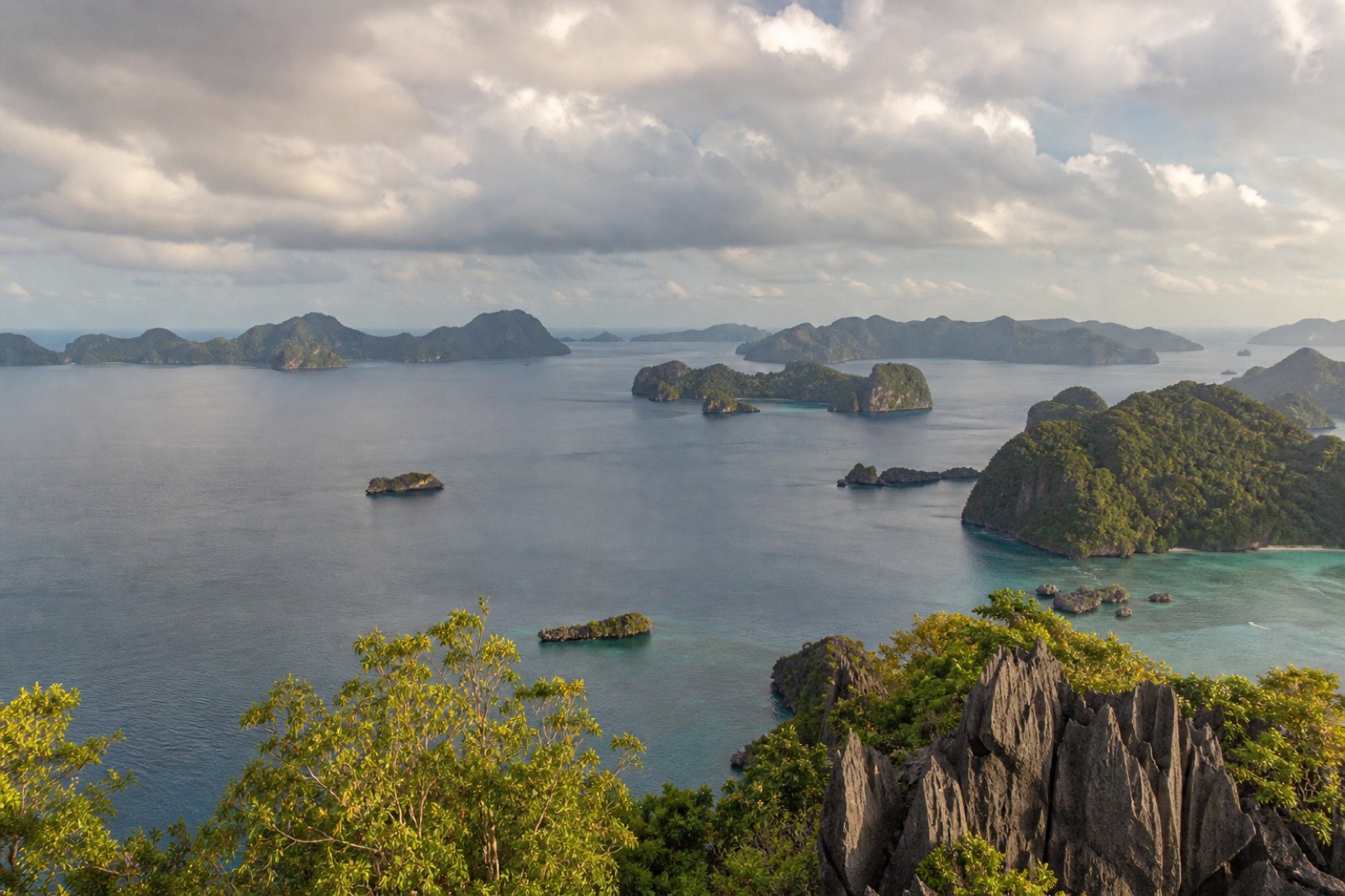 El Nido's Bacuit Archipelago with limestone karst cliffs rising from turquoise water